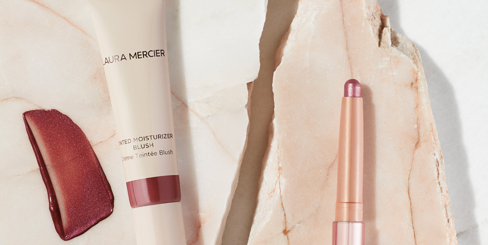 lose up image of Laura Mercier's Tinted Moisturizer Blush & RoseGlow Caviar Stick Eye Shadow