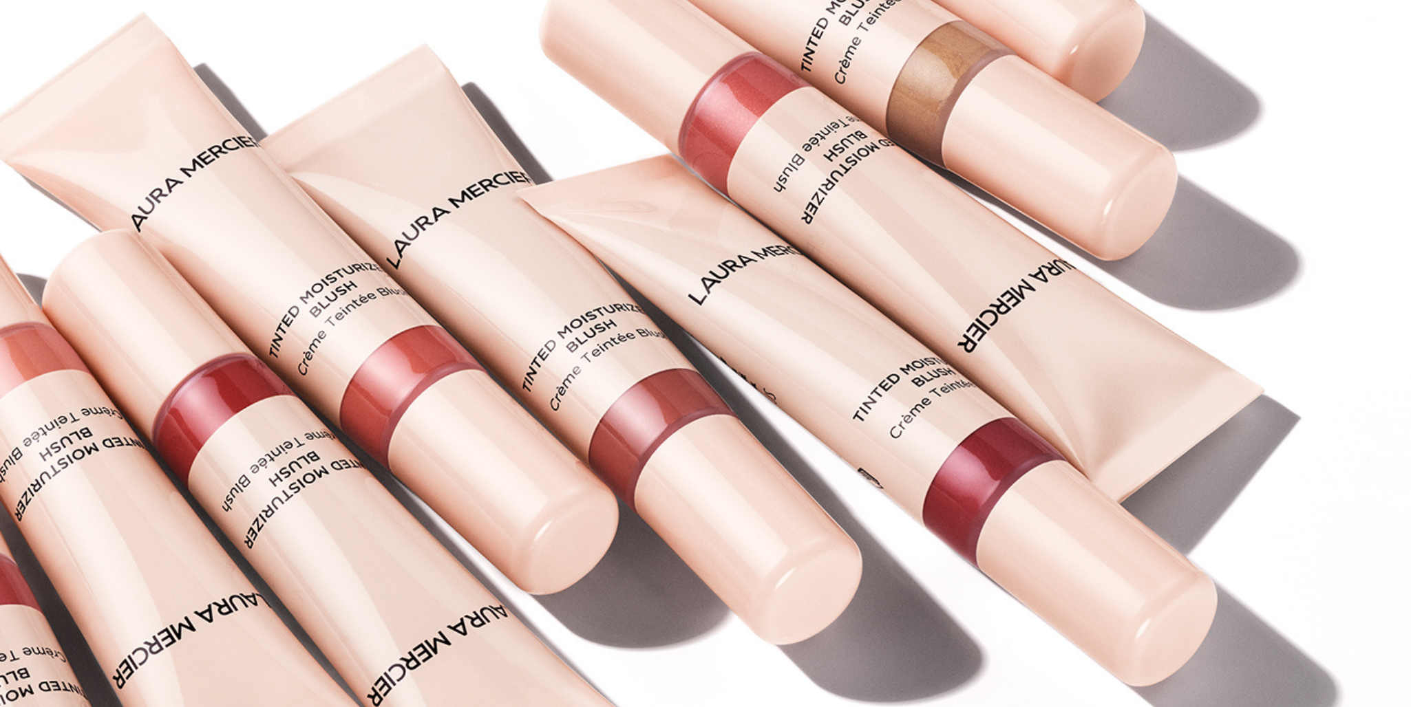 Lineup of Laura Mercier's Tinted Moisturizer Blush shades